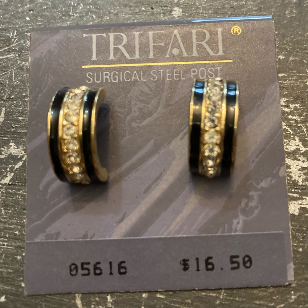 Vintage Trifari goldtone, black enamel, and clear stone earrings.